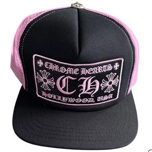 Pink & black chrome hearts hat. Slightly used. SnapBack so fits all